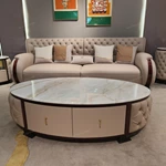 Oval White Marble Coffee Table with Cream Tufted Leather Sides and Two Drawers